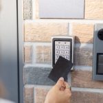 attaching-card-electronic-reader-access-office-apartment-close-up-card-entry-personal-identification-keyless-access-modern-technologies-concept