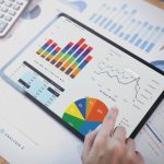 businesswoman-using-tablet-analysis-graph-company-finance-strategy-statistics-success-concept-planning-future-office-room